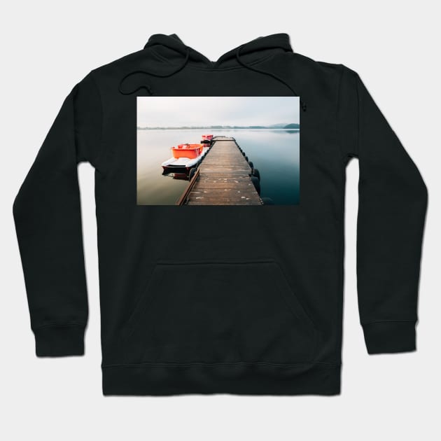 Two Pedal Boats Tied to Wooden Pier in Early Morning Light Hoodie by visualspectrum